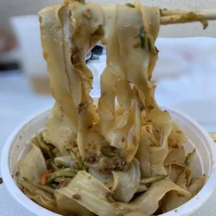 Spicy ground pork dry noodles (with wide flat noodles) mixed together!