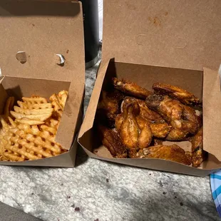 Smoked wings with hickory bbq seasoning and waffle fries! Damn good!
