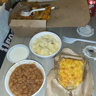 Baked beans, cornbread, Carolina gold, and spicy BBQ chicken, with white cheddar macaroni.