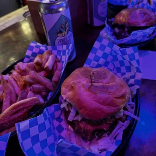 Deluxe burger and french fries on the left. Lao Burger on far right.