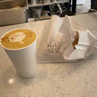 Golden oatmilk latte, strawberry &amp; peach scone, rhubarb cinnamon roll