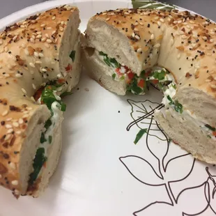 Less than three dollars for this everything bagel with veggies and cream cheese (i.e. Everything bagel with veggie cream cheese)