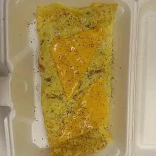 Sooooooo this is what i get when i ask for extra cheese in my veggie omelette... The sad part is that i love this place..... Smh