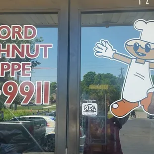 the front window of oxford doughnut shop