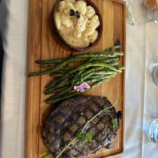 10oz prime ribeye with potato Pinocchio and asparagus