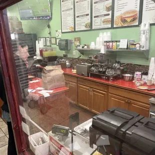 a woman standing in front of the counter