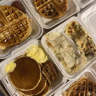 waffles, eggs, sausages, sausages, sausages and pancakes