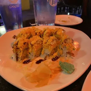 a close up of a plate of sushi