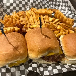 Mini burgers and bland over cooked waffle fries