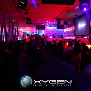 a crowd of people at a party