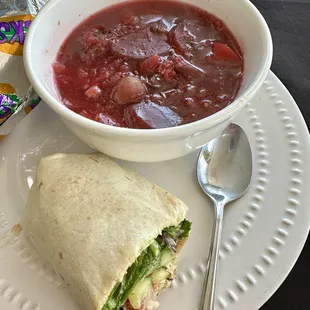 Borscht and za&apos;atar wrap with fresh salad inside.