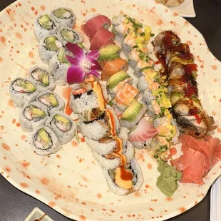 From left to right: California roll, shrimp California roll (top), Mexican roll, rainbow roll, Cancun roll, eel roll.