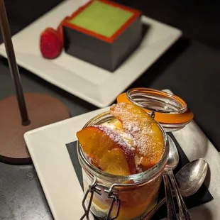 a dessert in a jar on a plate