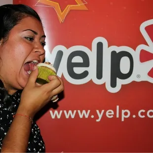 Paloma (owner of Sweet Addiction) eating one of her delicious creations.