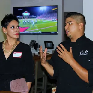 Drina and Steven (owners of Steve'Os) talking to the Yelpers.