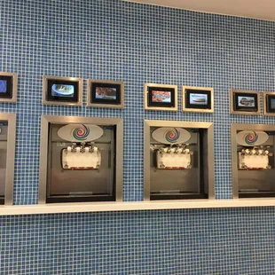 a row of ice cream machines