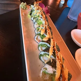 Hurricane  Sushi  Roll Tempura shrimp, salmon, tuna, jalapeño cucumber, spicy mayo, eel sauce.