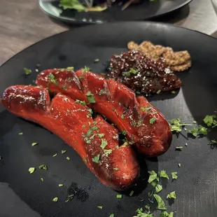 Sausage with fig jam and brown mustard