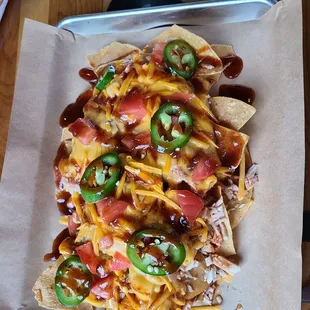 a tray of nachos on a table