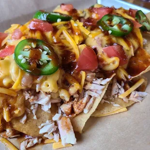 a plate of nachos on a table