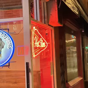 a neon sign for a restaurant