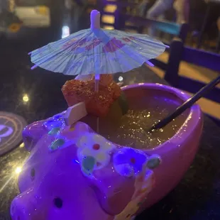 The spicy hula hog. Cucumber jalapeño tequila, trip sec, house made mango pineapple purée. Lime juice, jalapeno juice and Tabasco.