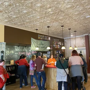 a group of people at a counter