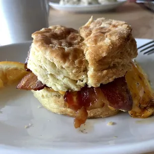 Egg, cheese and bacon biscuit sandwich. Biscuit was dry and egg as overcooked hard over