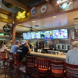 people sitting at the bar