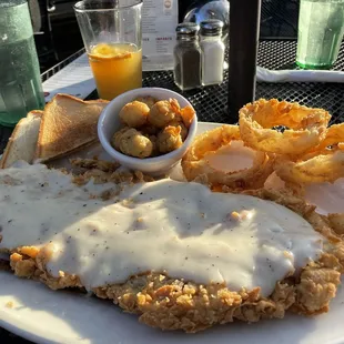 Chicken fried steak, onion rings and fried okra