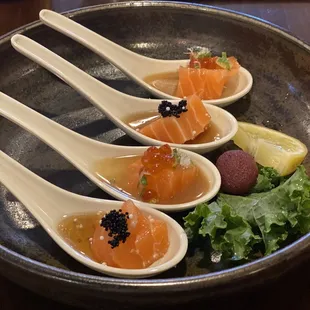 Salmon spoons with amazing sauces.