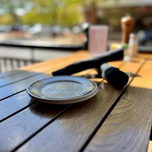 a plate on a wooden table