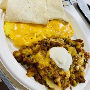 Chorizo Hash, cheesy eggs and tortillas