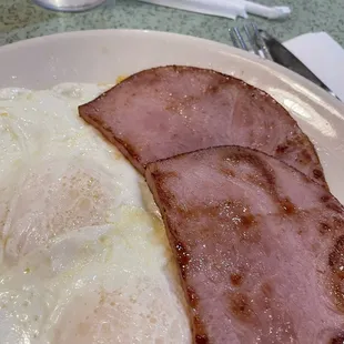 Eggs over easy and ham