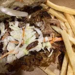 Pulling pork sandwich- Barely any coleslaw :( , but still pretty good.  (You put the homemade BBQ sauce on after they give it to you)