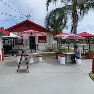 a man sitting at a picnic table