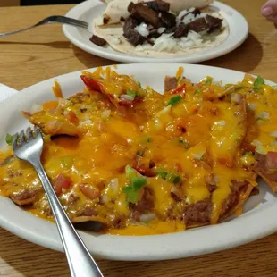 Nachos are excellent.  Retried beans, cheese, onions, and jalapeños...yum!!