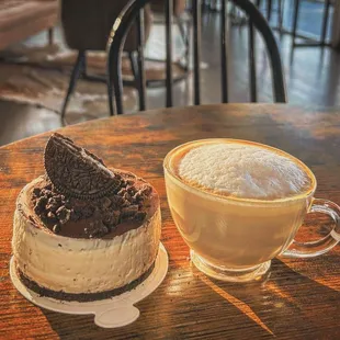 a cup of coffee and a cake