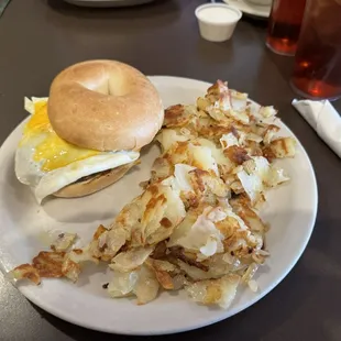 Sausage breakfast sandwich with home fries