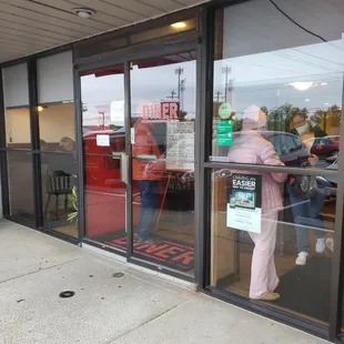 Walking up to the entrance where people were waiting