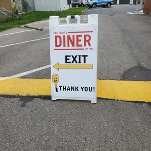 There are directions in the parking lot for getting to the back of the restaurant and back out