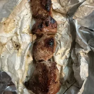 a piece of meat wrapped in foil