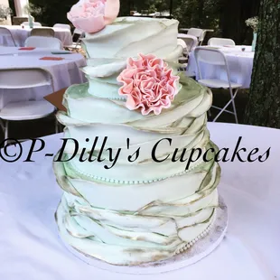One of my favorite cakes! 3 tiered antiqued cake with gum paste flowers.