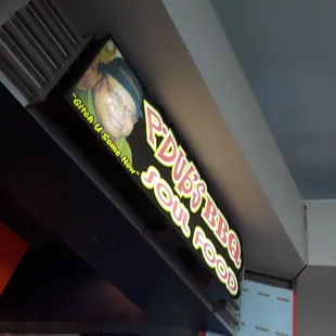 a neon sign for a restaurant