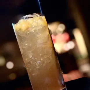 PEACH BOBA BREEZE Black tea, popping boba pearls, peach, lemon juice | Spike it: Knob Creek bourbon