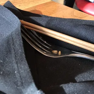 New silverwares with dried noodles and greasy stuffs. Gross!!!