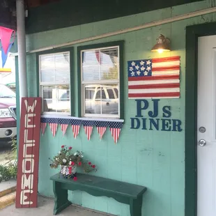 a bench outside of a restaurant