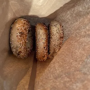 two bagels in a paper bag