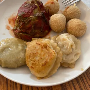 My plate of cabbage roll, Reuben balls and pierogies! Heated up items from their market.