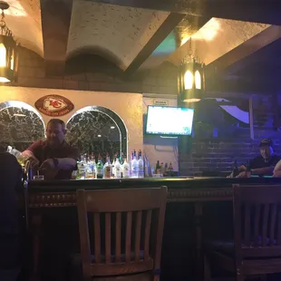 a man sitting at a bar